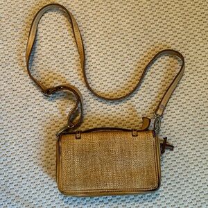 Vive la Difference woven leather wristlet